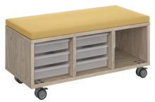 Load image into Gallery viewer, Modular storage unit with a two-column trays and one column cubby configuration for organized, accessible classroom storage and optional seat pad converts it into a mobile bench with customizable laminate finishes.