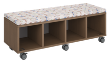 Load image into Gallery viewer, Mobile storage unit with four cubby columns, optional upholstered seat for seating, customizable laminate finishes, and casters for easy mobility.