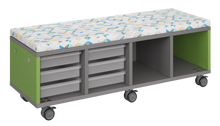 Load image into Gallery viewer, Mobile storage unit with a four column, tray and cubby configuration, optional upholstered seat for seating, customizable laminate finishes, and casters for easy mobility.