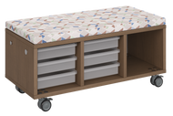 Modular storage unit with a two-column trays and one column cubby configuration for organized, accessible classroom storage and optional seat pad converts it into a mobile bench with customizable laminate finishes.