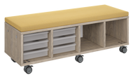 Mobile storage unit with a four column, tray and cubby configuration, optional upholstered seat for seating, customizable laminate finishes, and casters for easy mobility.