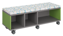 Load image into Gallery viewer, Mobile storage unit with a three column, tray and shelf configuration, optional upholstered seat for seating, customizable laminate finishes, and casters for easy mobility.
