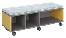 Load image into Gallery viewer, Mobile storage unit with a three column, tray and shelf configuration, optional upholstered seat for seating, customizable laminate finishes, and casters for easy mobility.
